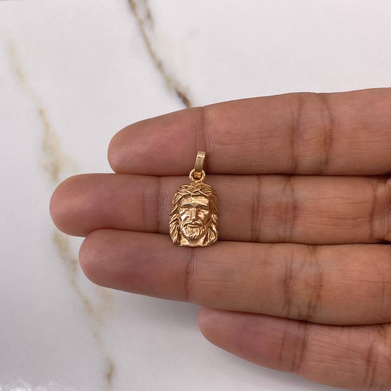 Dije Rostro de Cristo 1.85gr / 2.2cm / Liso Oro Rosa $