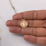 Dije San Benito 0.95gr / 2.3cm / Plano Troquelado Oro Rosa $