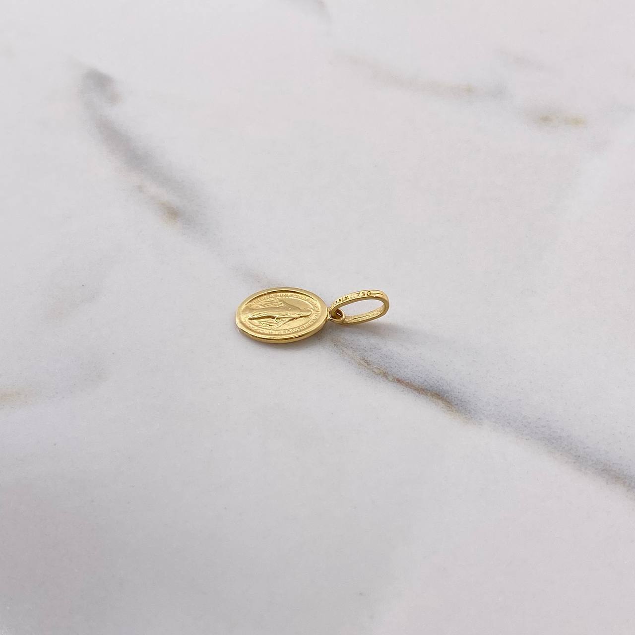 Dije Virgen Milagrosa 0.95gr / 1.8cm / Troquelado Oro Amarillo $