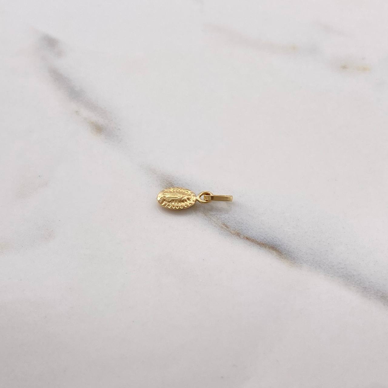 Dije Virgen de Guadalupe 0.25gr / 1.4cm / Soplado Oro Amarillo $