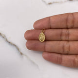 Dije Virgen del Carmen 0.45gr / 1.8cm / Troquelado Oro Amarillo $