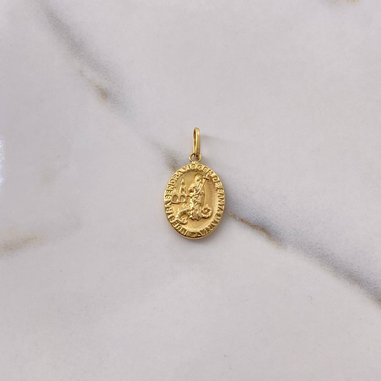 Dije Virgen De Santa Marta 1.1gr / 2.4cm / Troquelado Oro Amarillo $