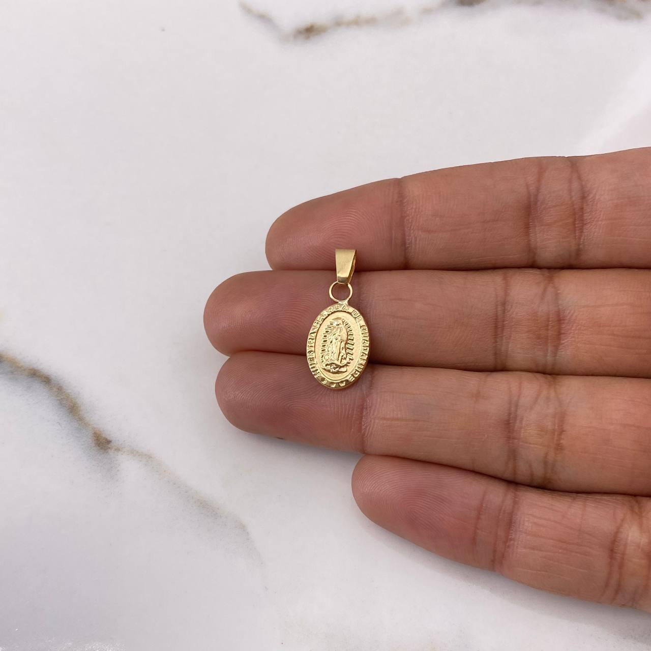 Dije Virgen de Guadalupe 0.9gr / 2.1cm / Troquelado Oro Amarillo $