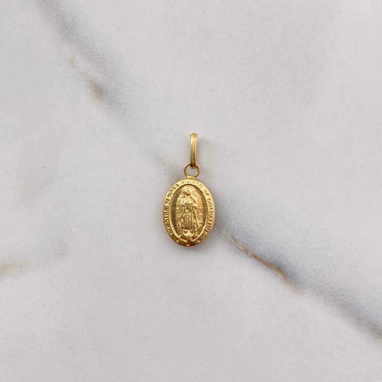 Dije Virgen de Guadalupe 0.6gr / 2cm / Troquelado Oro Amarillo $