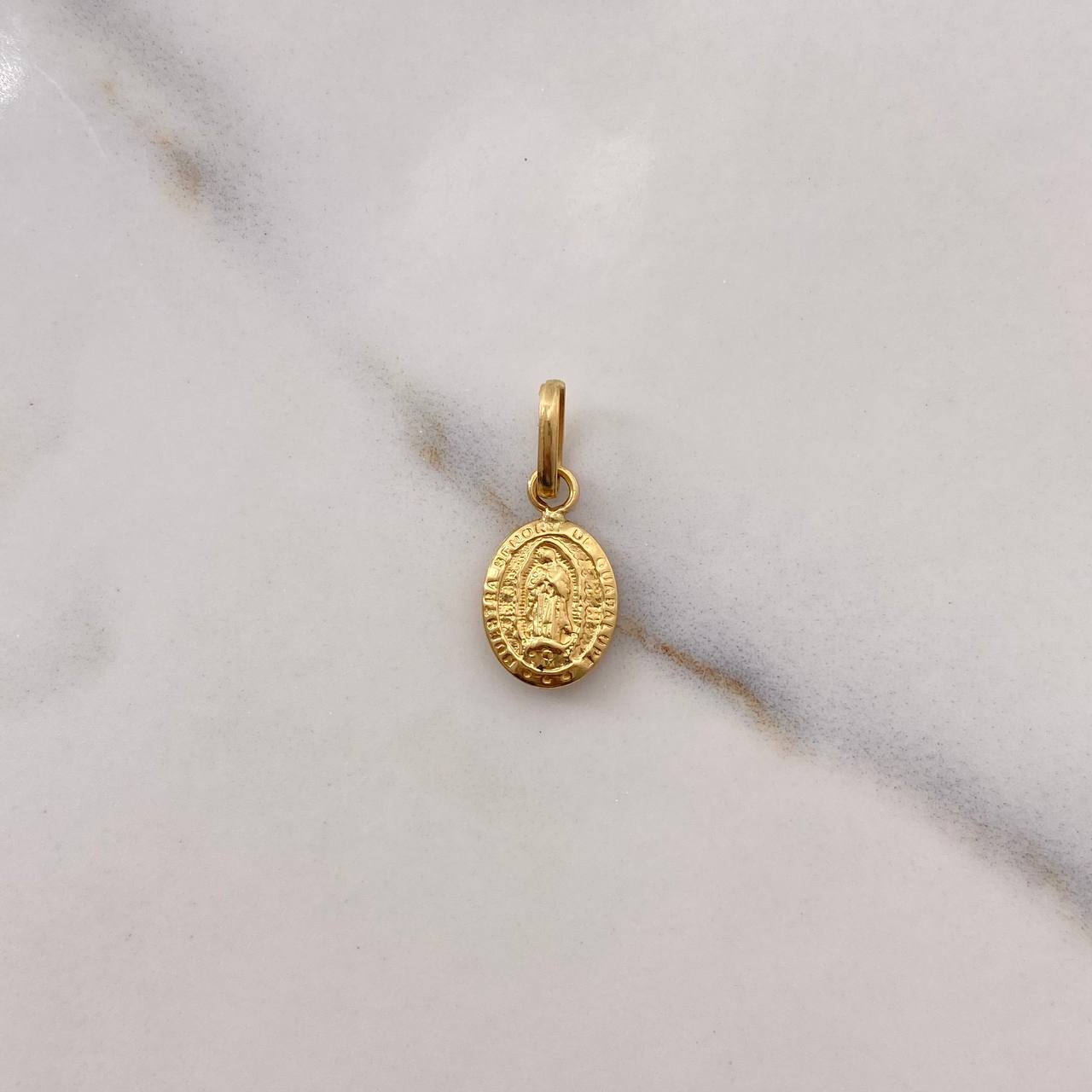 Dije Virgen de Guadalupe 0.7gr / 1.8cm / Troquelado Oro Amarillo $