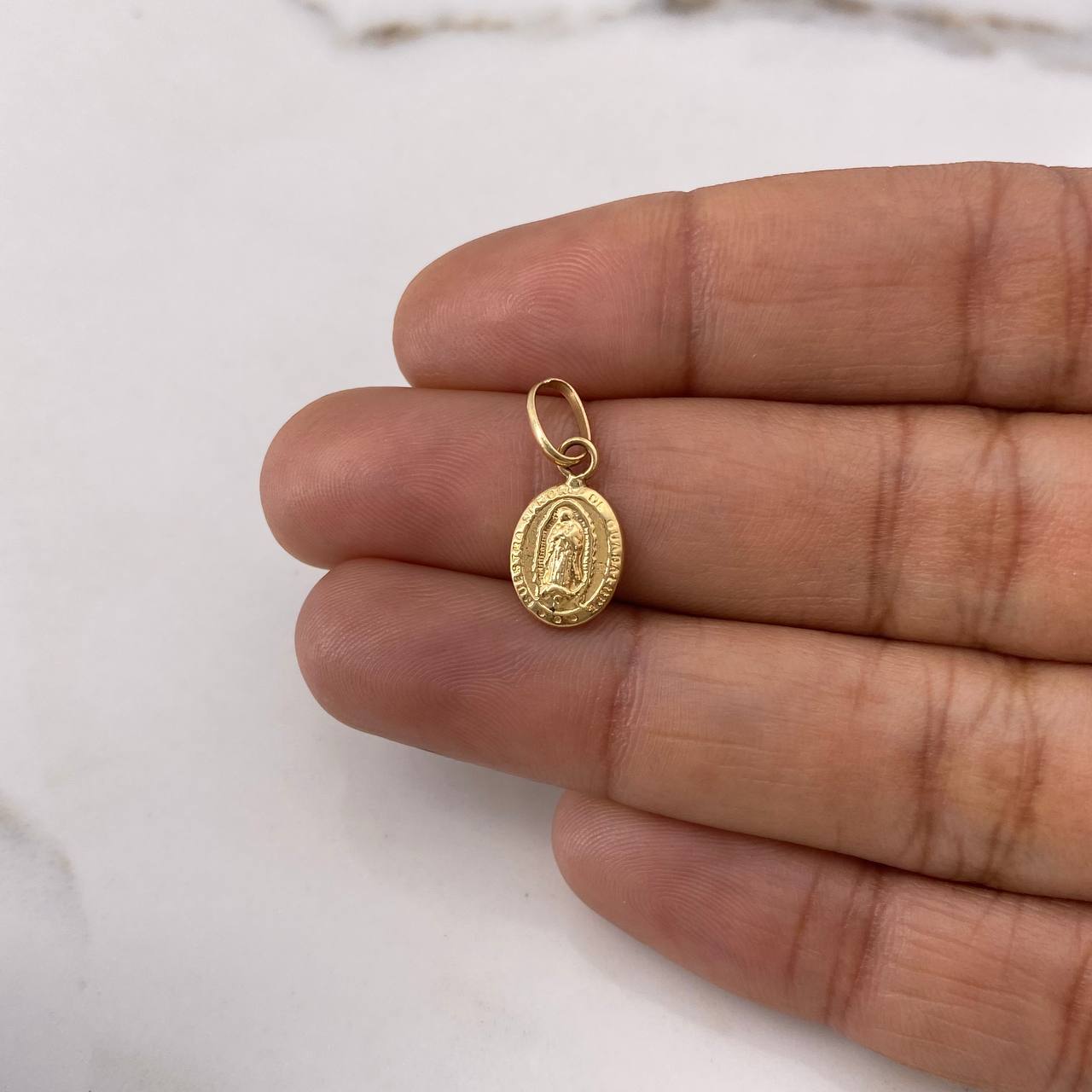 Dije Virgen de Guadalupe 0.7gr / 1.8cm / Troquelado Oro Amarillo $