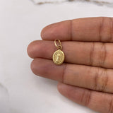 Dije Virgen de Guadalupe 0.7gr / 1.8cm / Troquelado Oro Amarillo $