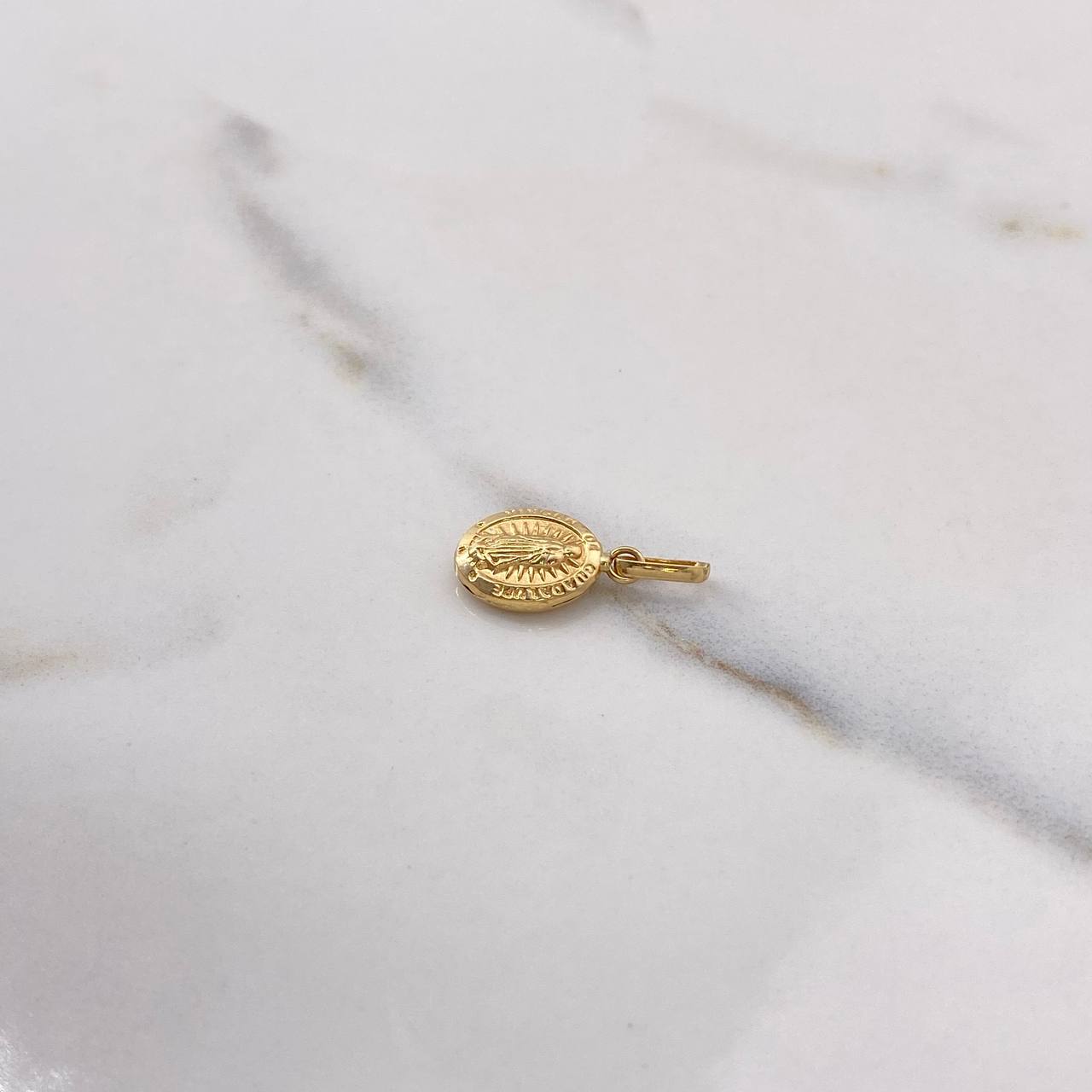 Dije Virgen de Guadalupe 0.5gr / 1.8cm / Troquelado Oro Amarillo $
