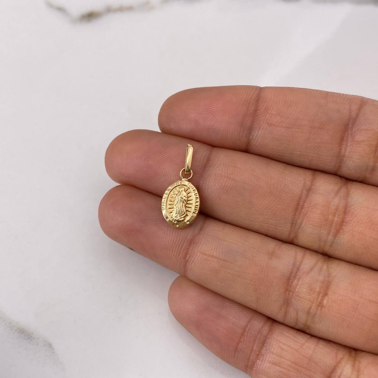 Dije Virgen de Guadalupe 0.5gr / 1.8cm / Troquelado Oro Amarillo $