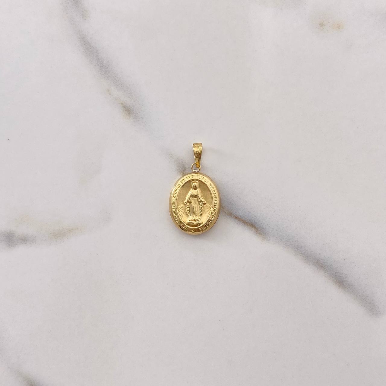Dije Virgen Milagrosa 0.85gr / 2.4cm / Troquelado Oro Amarillo $