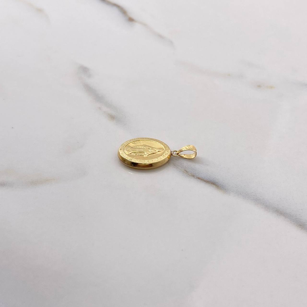 Dije Virgen Milagrosa 0.85gr / 2.4cm / Troquelado Oro Amarillo $