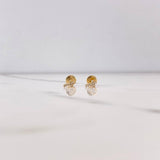 Topos Cruz 0.65gr / 6mm / Circones Blancos Oro Amarillo $