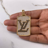 Dije Placa Rectangular LV 28gr / 5.6cm / Circones Blancos Negros Oro Amarillo $