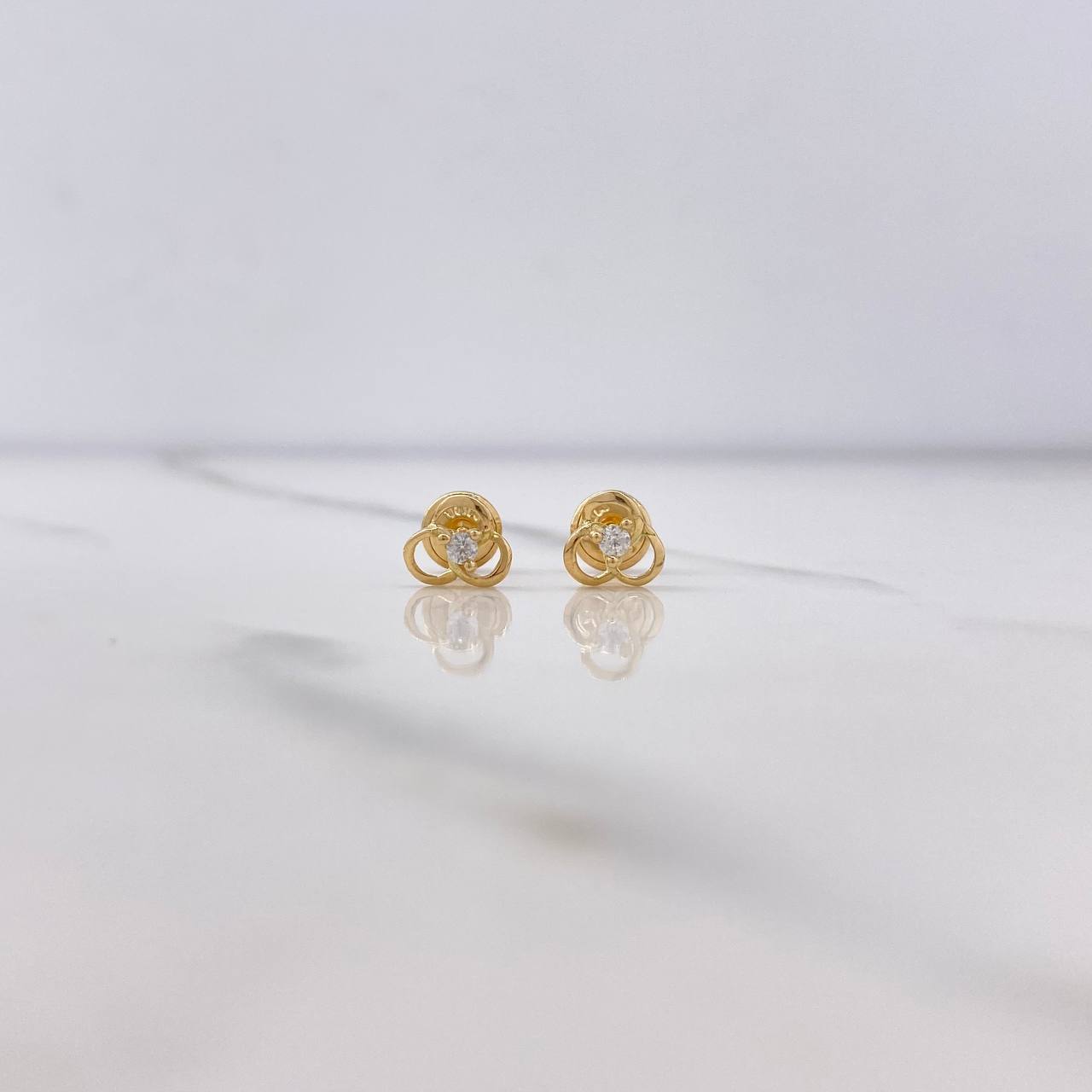 Topos Tres Aros 0.7gr / Circon Blanco Oro Amarillo $