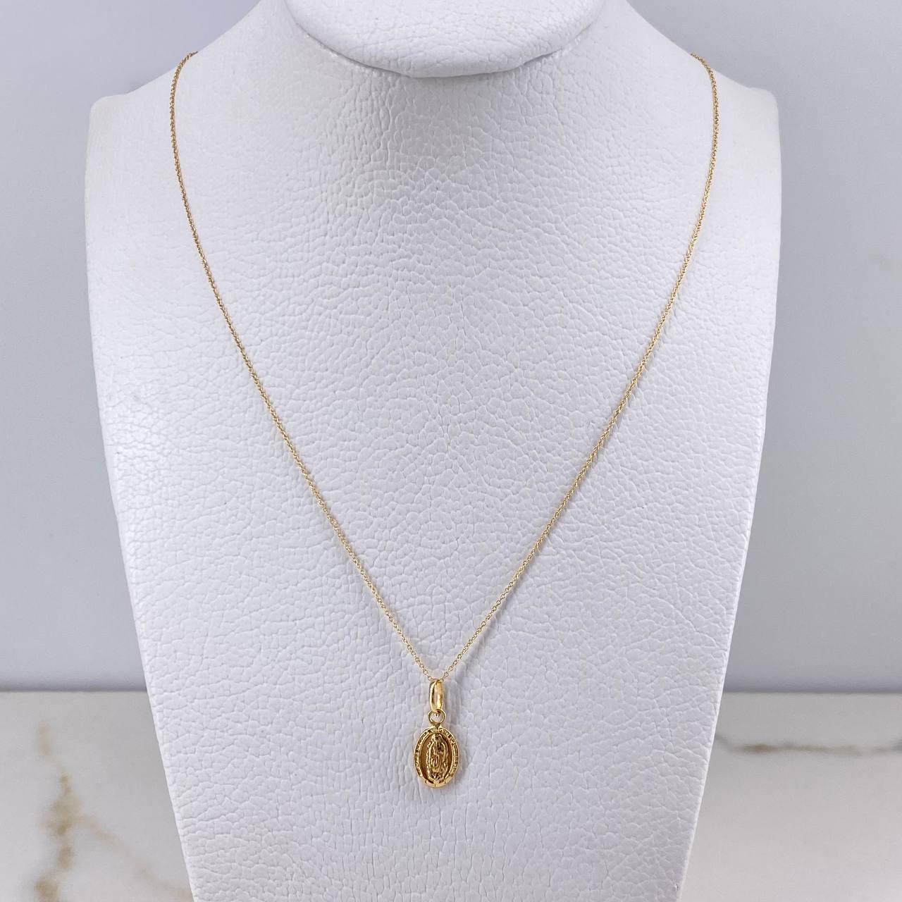 Cadena Aro Seguido 0.6gr / 45cm + Dije Virgen Guadalupe 0.3gr / 1.7cm / Oro Amarillo (Oferta) $