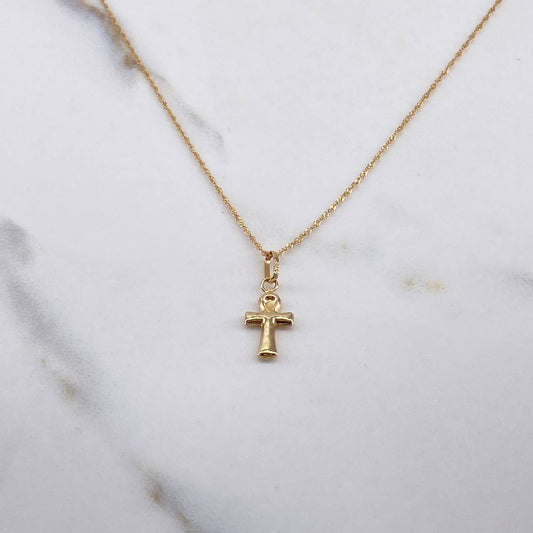 Cadena Singapur 0.85gr / 50cm + Dije Cruz Anj 0.4gr / 2cm / Oro Amarillo (Oferta) $