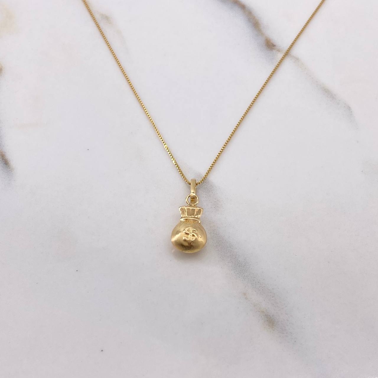 Cadena Veneciana 1.4gr / 50cm + Dije Bolsa Dinero 0.4gr / 1.8cm / Oro Amarillo (Oferta) $