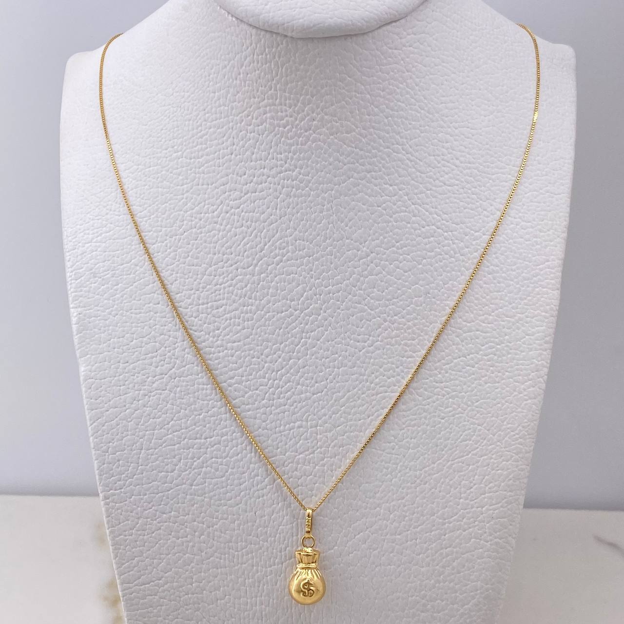 Cadena Veneciana 1.4gr / 50cm + Dije Bolsa Dinero 0.4gr / 1.8cm / Oro Amarillo (Oferta) $