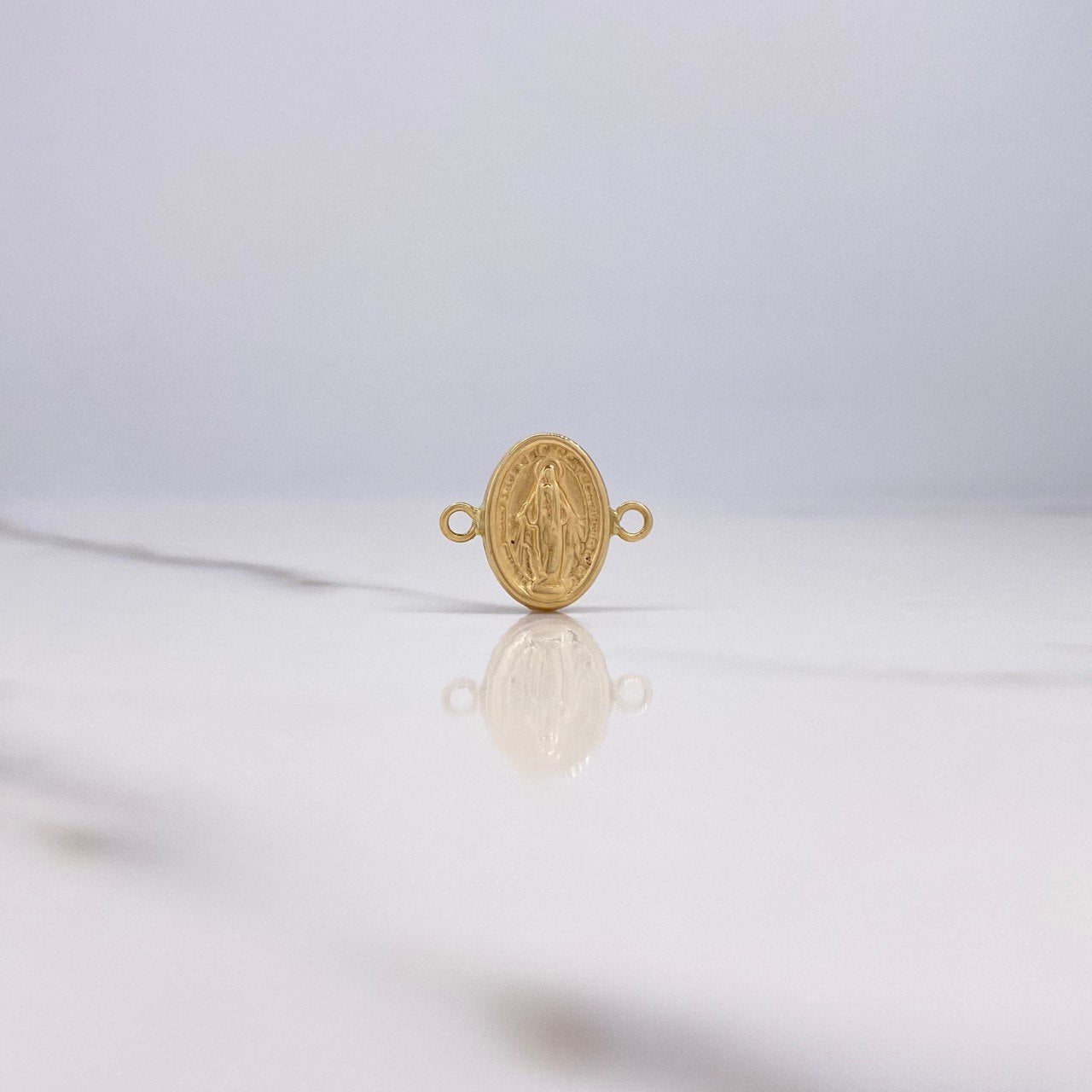 Herraje Virgen Milagrosa 0.65gr / 1.5cm / Oro Amarillo $