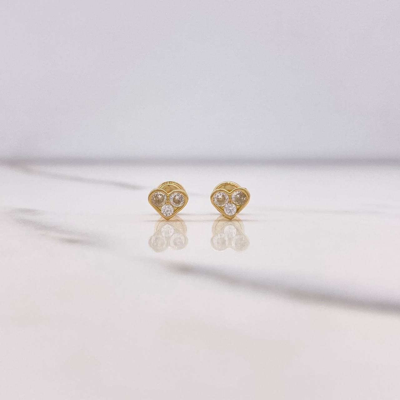Topos Corazón 0.85gr / Circones Blancos Oro Amarillo $