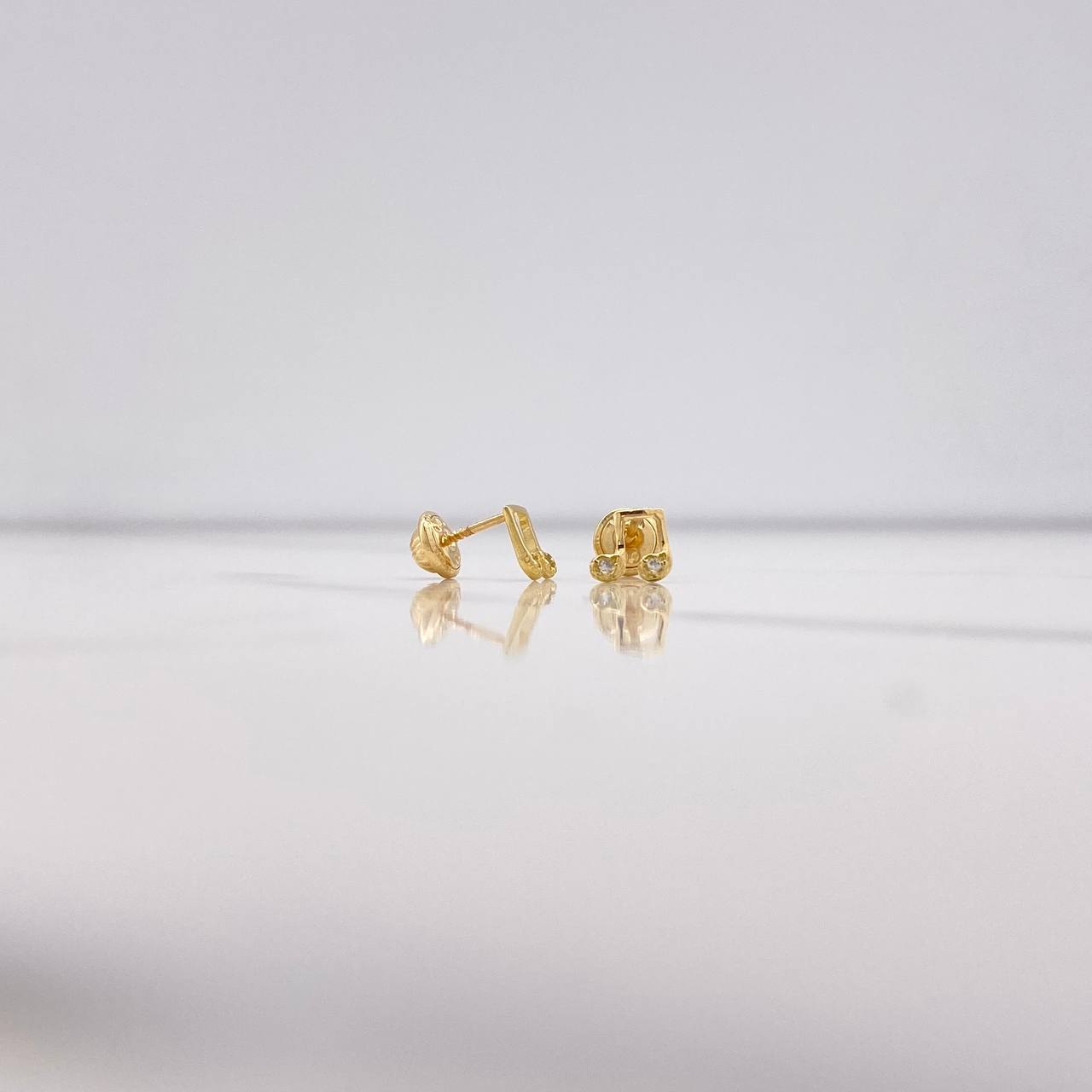 Topos Nota Musical 0.75gr / Circones Blancos Oro Amarillo $