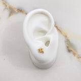 Topos Patines 0.8gr / Circones Blancos Oro Amarillo $