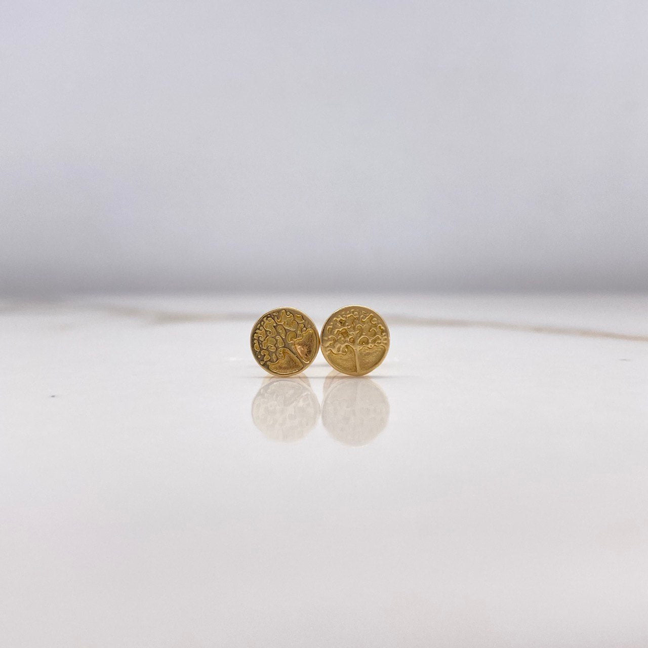 Topos Circulo Arbol 1.2gr / Oro Amarillo $