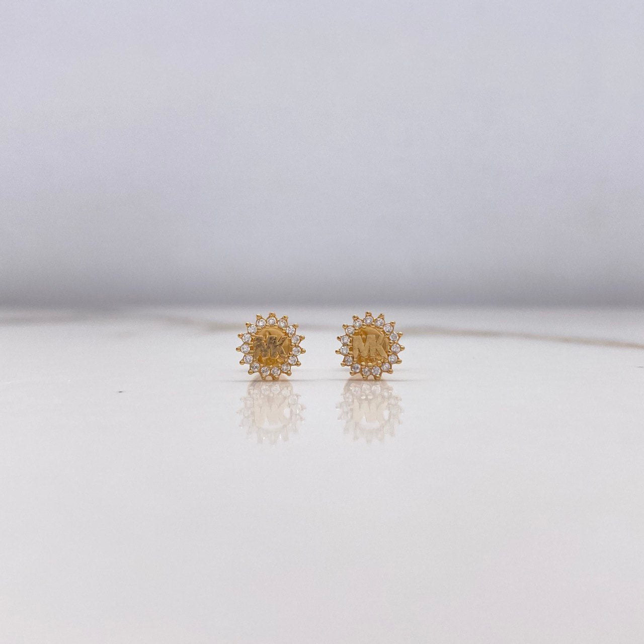 Topos Mk 0.95gr / Circones Blancos Oro Amarillo $