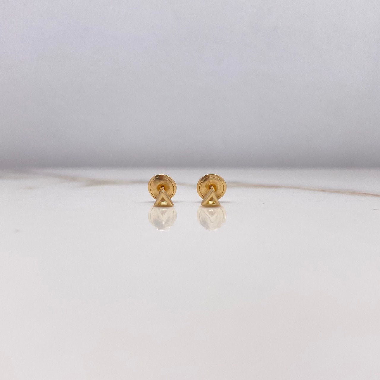 Topos Triangulo 0.5gr / Lisos Oro Amarillo $
