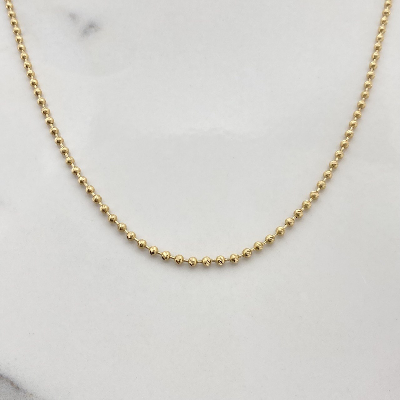 Cadena Militar 12.75gr / 55cm / 2.3mm Bolas Diamantadas Oro Amarillo $