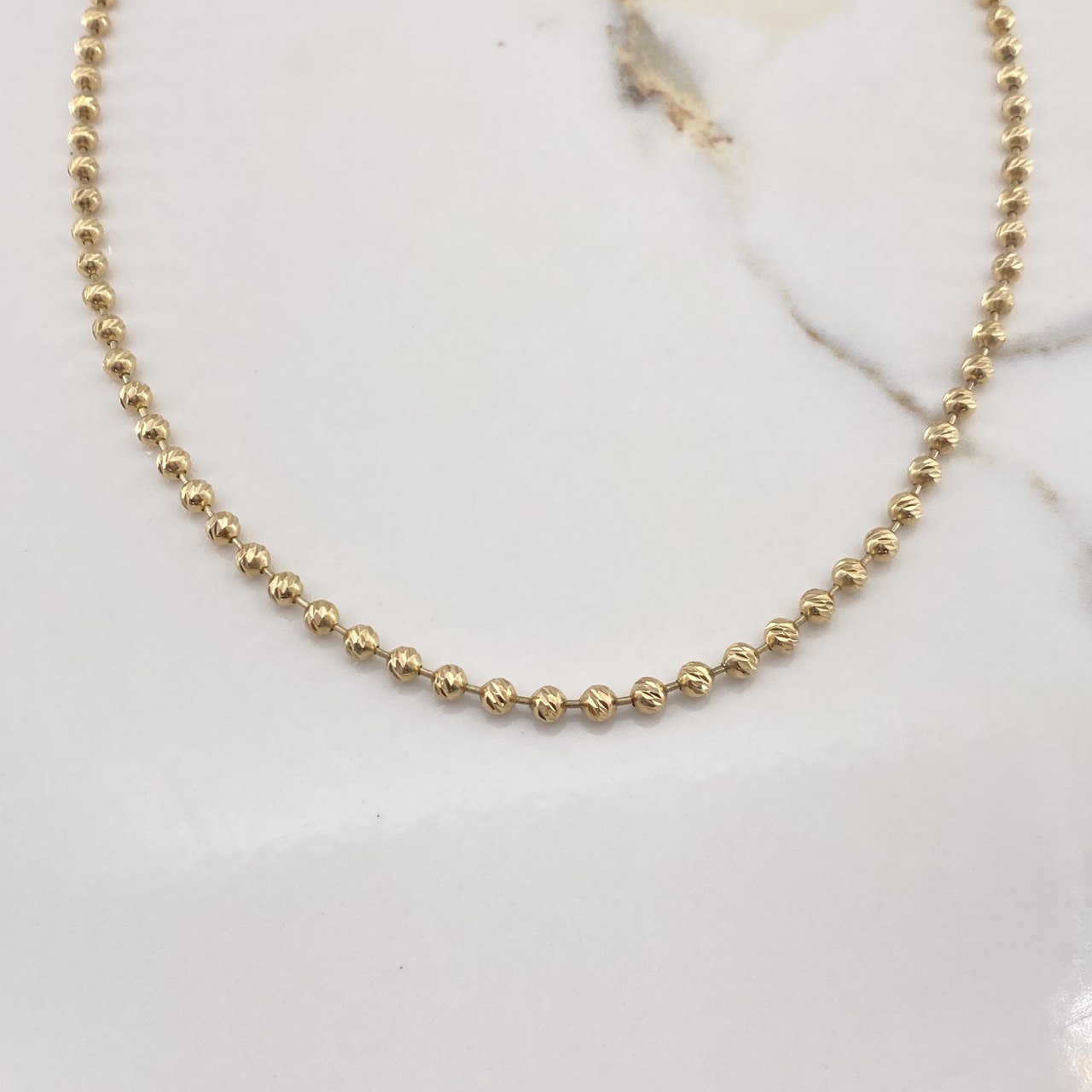 Cadena Militar 25.45gr / 65cm / 4mm Bolas Diamantadas Oro Amarillo $