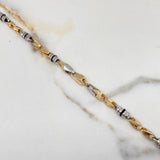 Cadena Rustica Espiga 52.10gr / 60cm / 5mm Barril Cauchos Negros Dos Oros Amarillo Blanco $