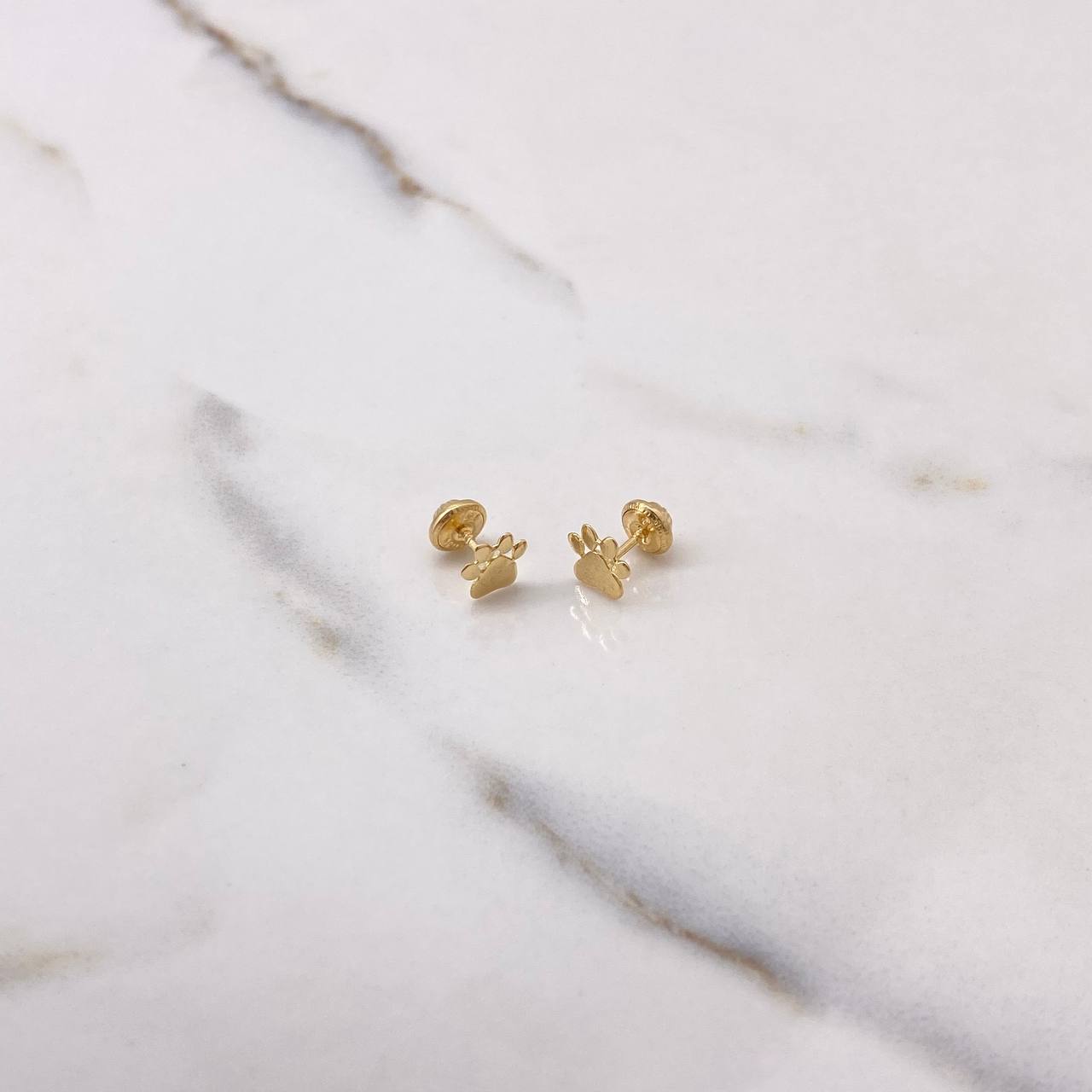 Topos Huella 0.7gr / Oro Amarillo $