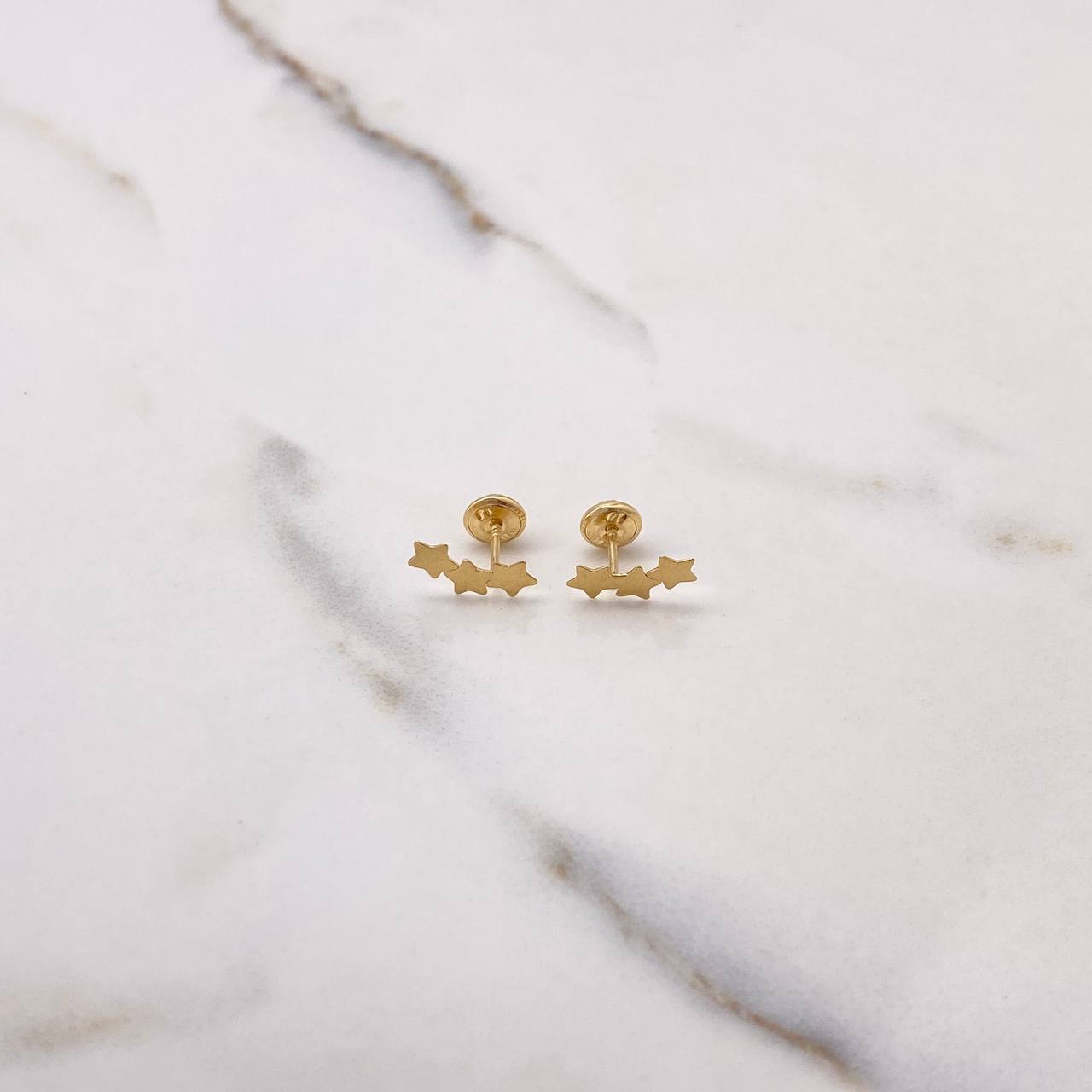 Topos Trio Estrellas 0.6gr / Lisos Oro Amarillo $