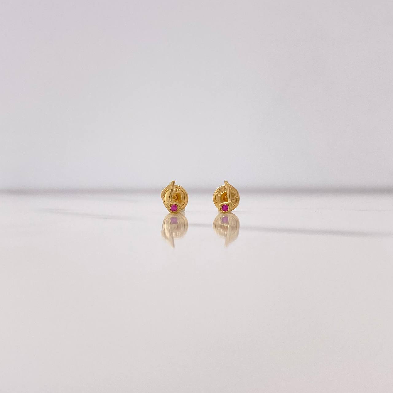 Topos Nota Musical 0.6gr / Circon Fucsia Oro Amarillo $
