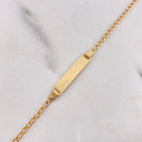 Pulso Bebé Espiga 1.9gr / 15cm / Placa Rectangular Oro Amarillo $