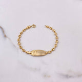 Pulso Bebé GC 1.95gr / 14cm / 9mm Placa Ovalada Divino Niño Oro Amarillo $