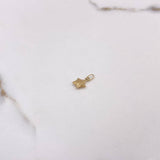Dije Estrella  0.2gr / 1cm / Liso  Oro Amarillo $