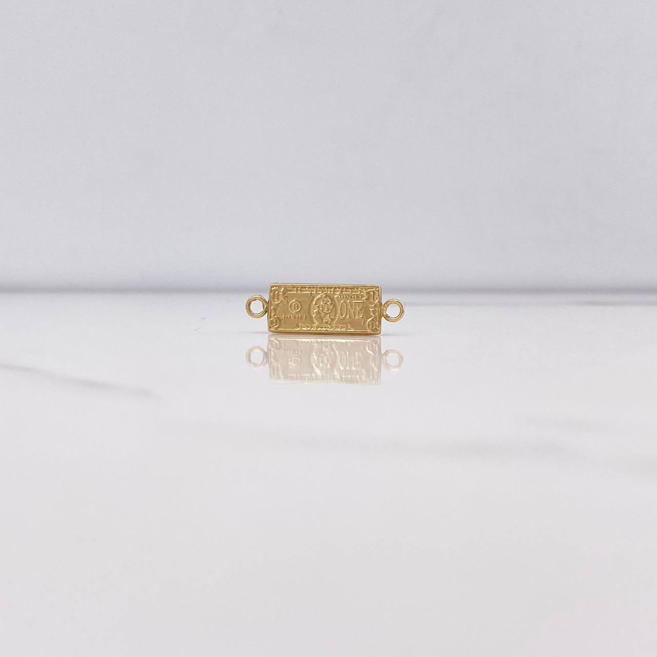 Herraje One Dólar 0.9gr / 1.3cm / Oro 18K