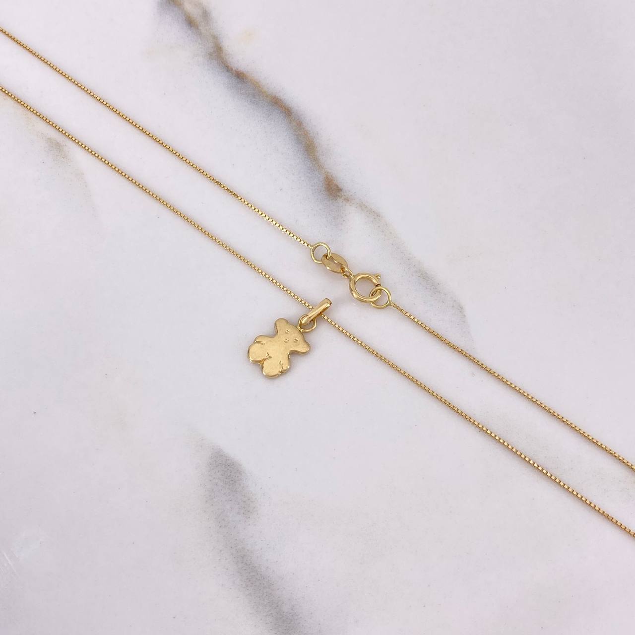 Cadena Veneciana 1.35gr / 50cm + Dije Oso TS 0.3gr / 1.5cm / Oro Amarillo (Oferta) $