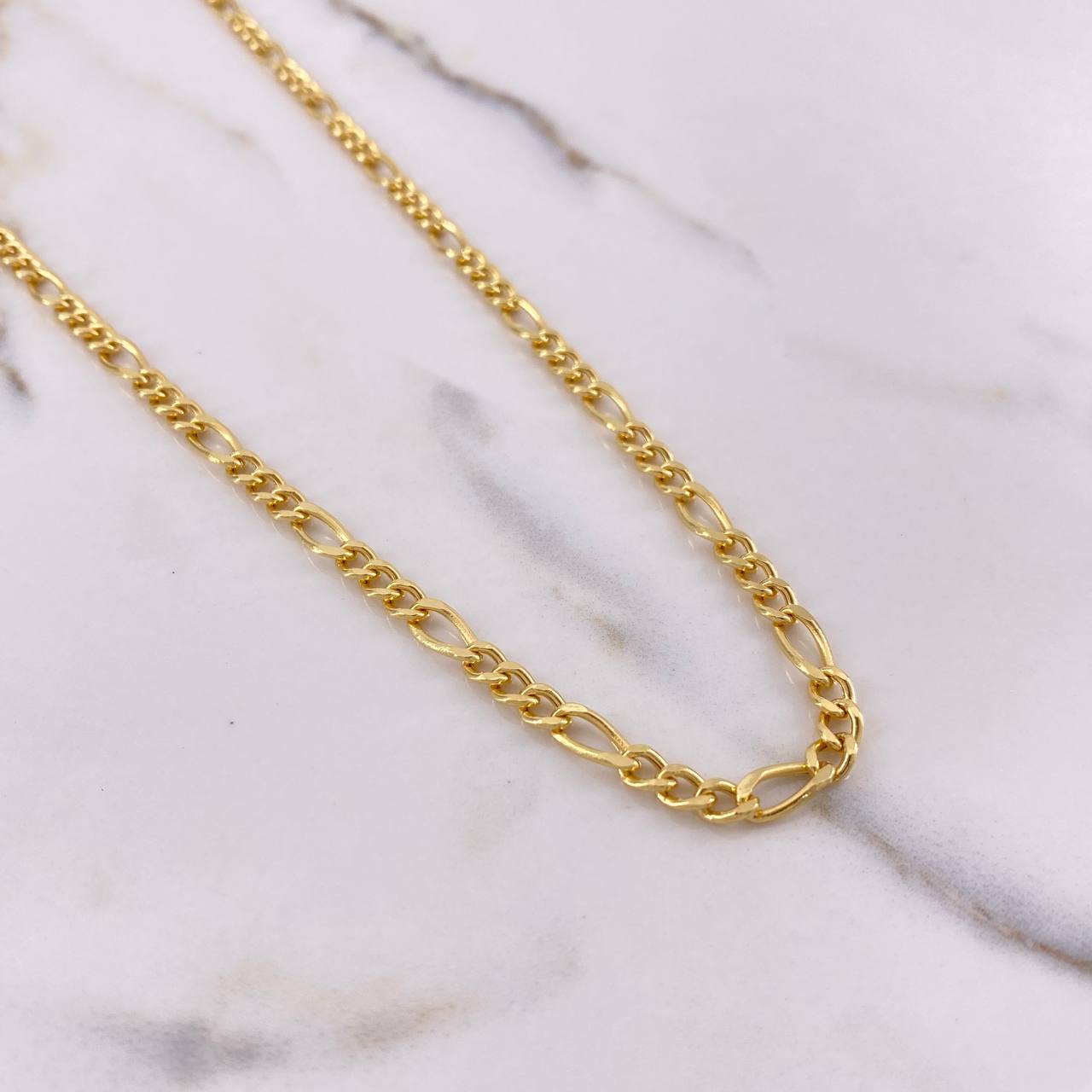 Cadena Figaro 9.75gr / 60cm / 4mm Oro Amarillo +0 $