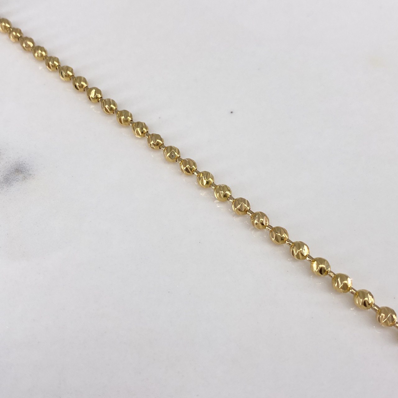 Cadena Militar 20.65gr / 65cm / 3mm Bolas Diamantadas Oro Amarillo $