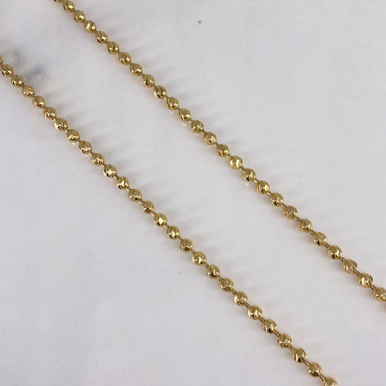 Cadena Militar 20.65gr / 65cm / 3mm Bolas Diamantadas Oro Amarillo $