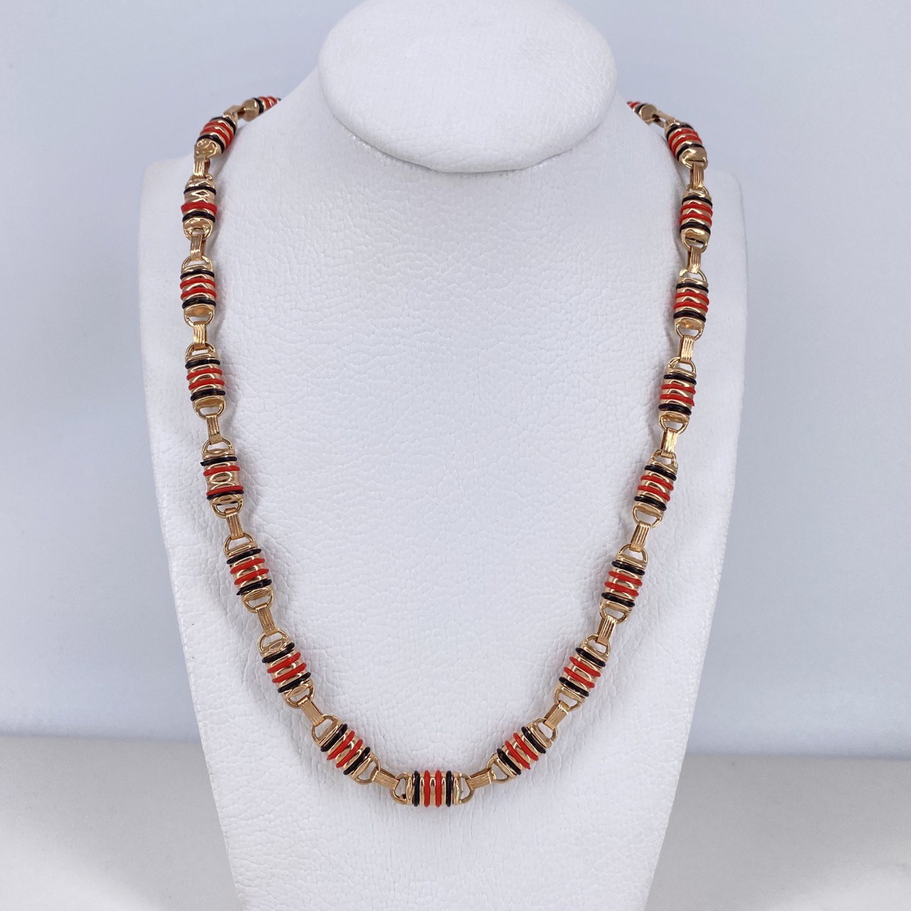 Cadena Rustica Rayada 21.25gr / 65cm / 6mm Barril Cauchos Negros-Rojos Oro Rosa $