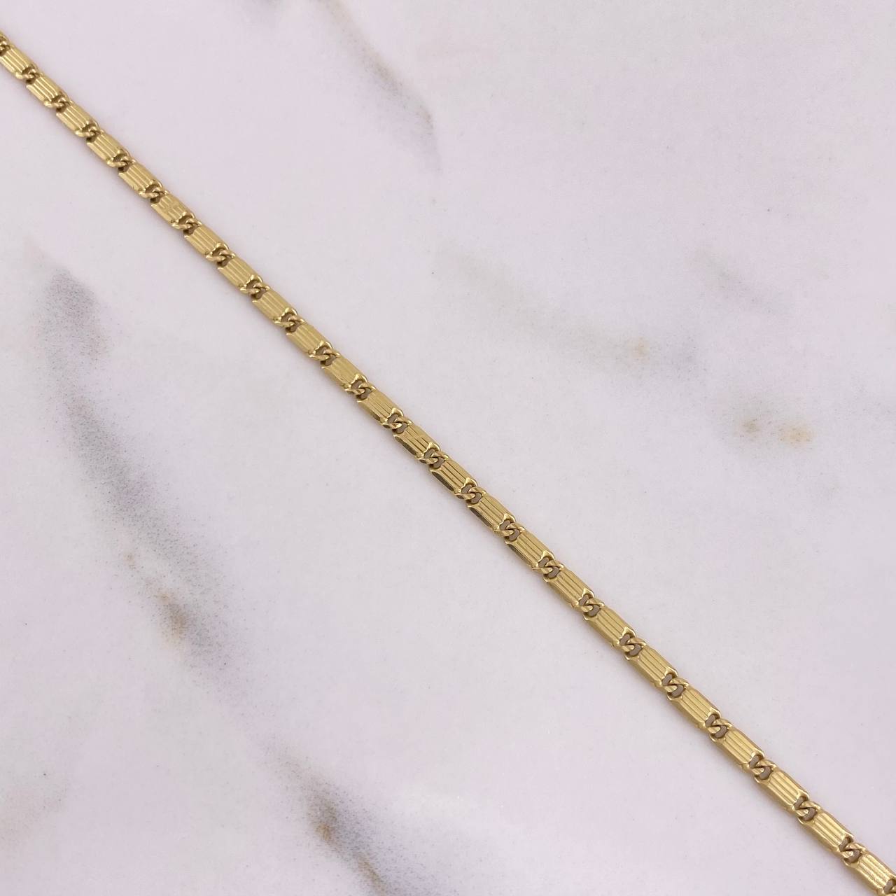 Pulso Plano Rayado 4.9gr / 19cm / 2mm Oro Amarillo $