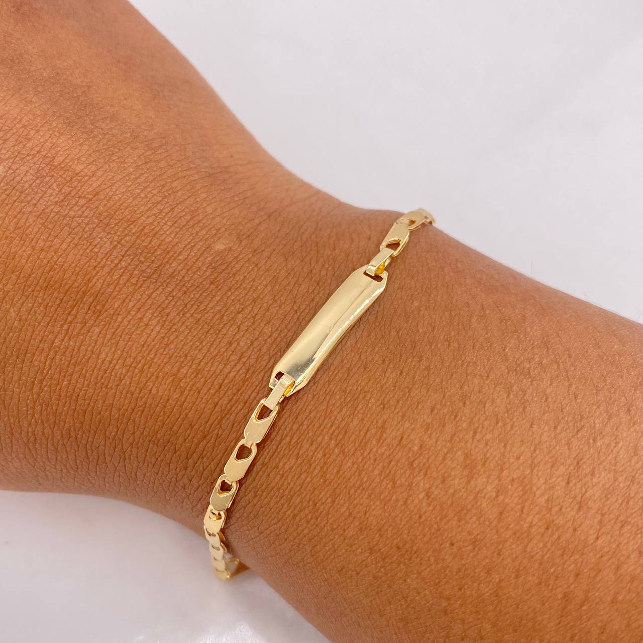 Pulso Bebe Ojiva 1.95gr / 16cm / 3mm Placa Rectangular Curva Lisa Oro Amarillo $