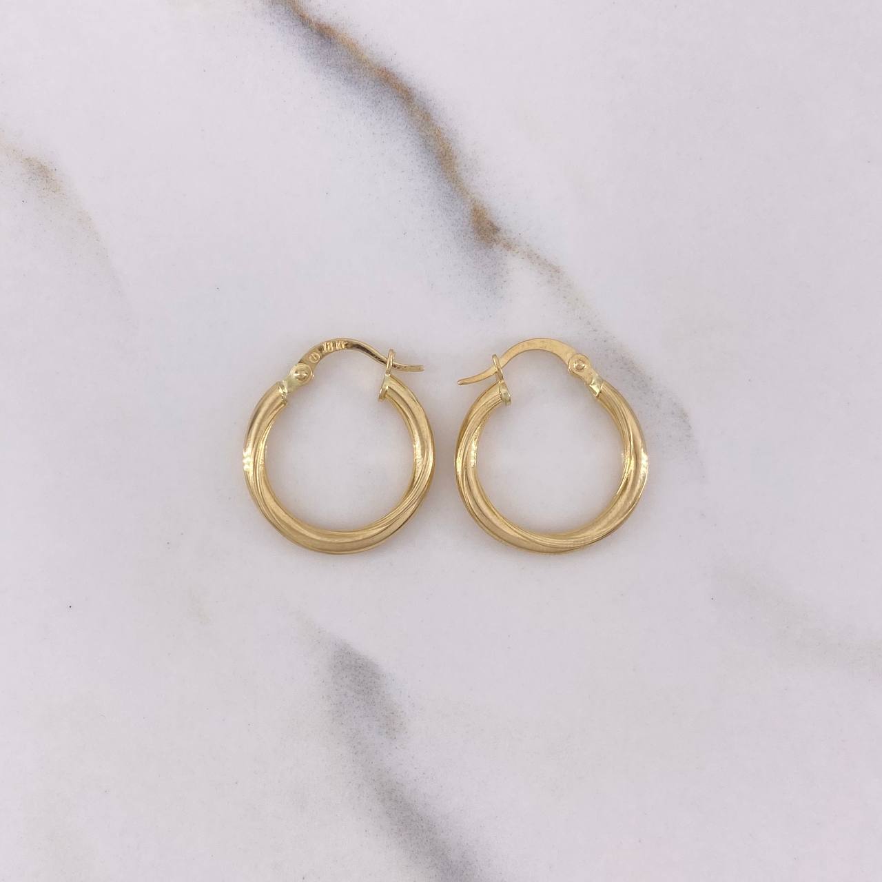 Candongas Kris 1.5gr / 2cm / Entorchadas Oro Amarillo $