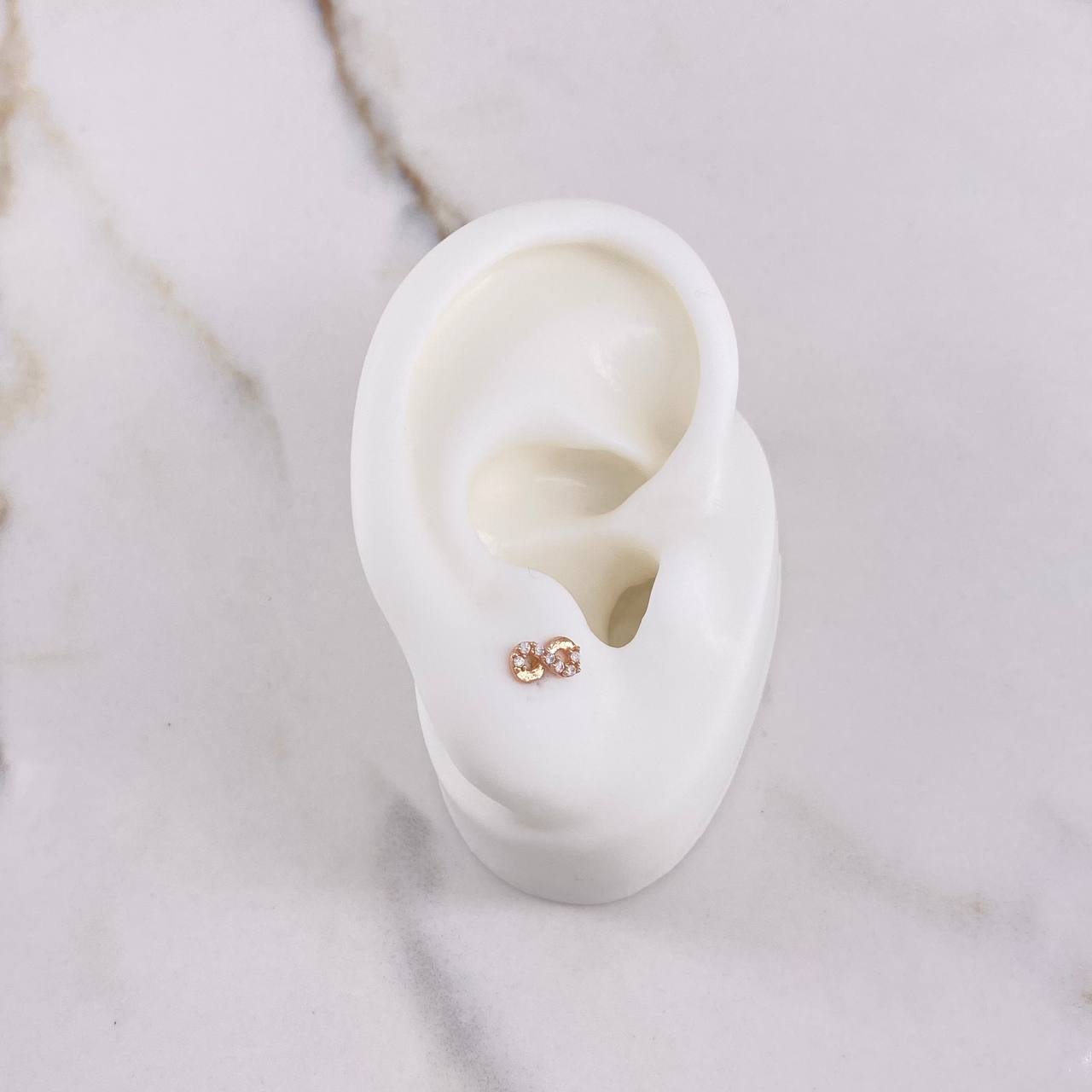 Topos Infinito 0.65gr / Circones Blancos Oro Rosa $