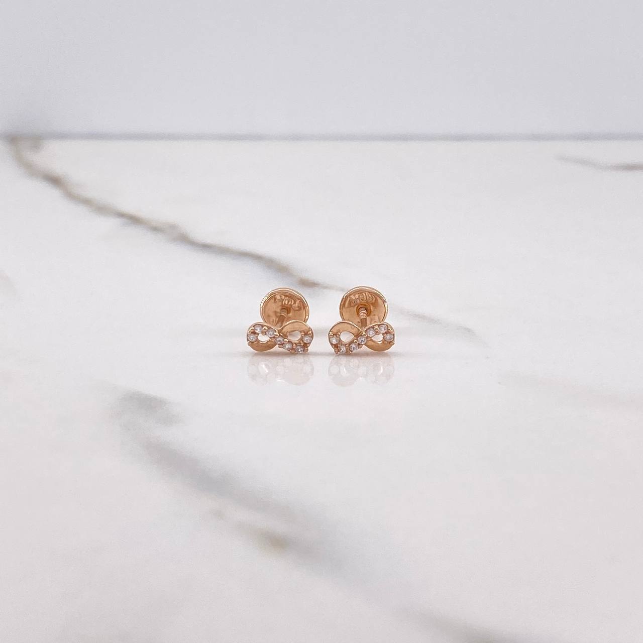 Topos Infinito 0.65gr / Circones Blancos Oro Rosa $