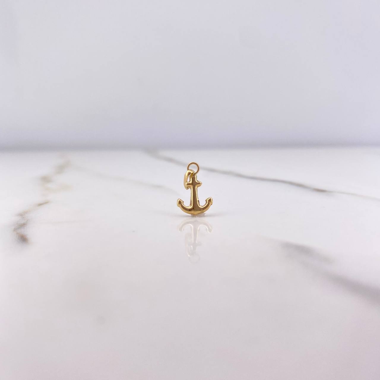 Dije Ancla 0.2gr / 1.5cm / Troquelado Oro Amarillo &